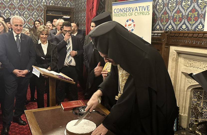 The Vasilopita cake being cut